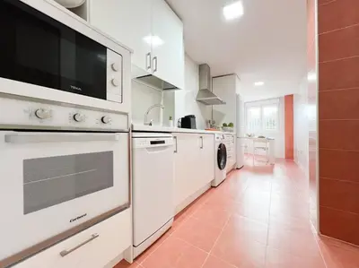 Una cocina o zona de cocina en Apartamentos Gredos 101
