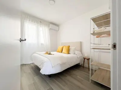 Cama o camas de una habitación en Apartamentos Gredos 304
