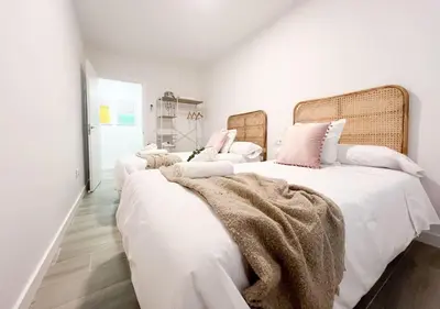 Cama o camas de una habitación en Apartamentos Gredos 301