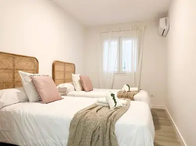 Cama o camas de una habitación en Apartamentos Gredos 301