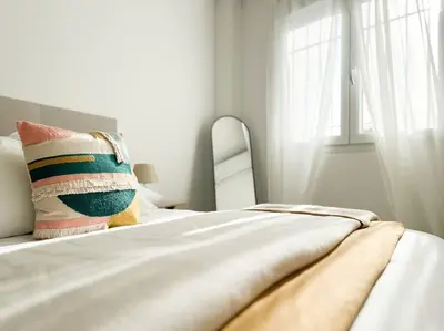 Cama o camas de una habitación en Apartamentos Gredos 204