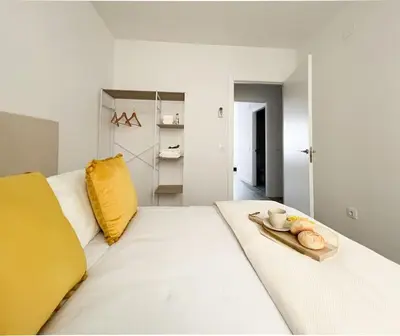 Cama o camas de una habitación en Apartamentos Gredos 204