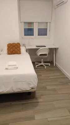 Cama o camas de una habitación en Apartamentos Gredos 204