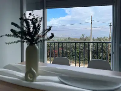Un balcón o terraza de Apartamentos Gredos 203
