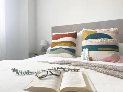 Cama o camas de una habitación en Apartamentos Gredos 202