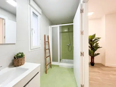 Un baño de Apartamentos Gredos 201