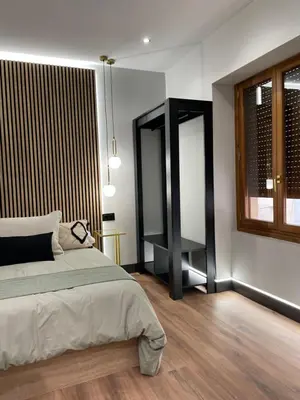 Cama o camas de una habitación en Plaza Mayor de Salamanca Apartamentos
