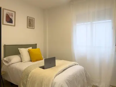Cama o camas de una habitación en TAYP San Marcos 107