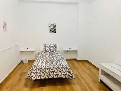 Cama o camas de una habitación en Piso con encanto en Santa Amalia