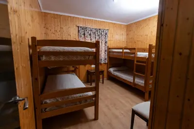 Cama o camas de una habitación en Hostal - Bungalows Camping Cáceres