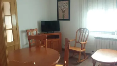 Una televisión o centro de entretenimiento en Casa Rural el Maestro II