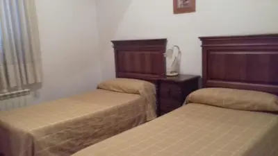 Cama o camas de una habitación en Casa Rural del Río Tejos