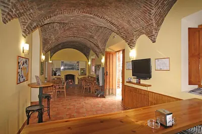 Una televisión o centro de entretenimiento en Casa Rural 