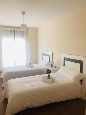 Cama o camas de una habitación en Apartamento Puente Romano Portal 4 1-B