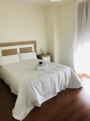 Cama o camas de una habitación en Apartamento Puente Romano P1-1B