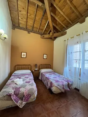 Cama o camas de una habitación en Casa Rural Concejo 1